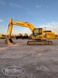 Front of used Excavator,Used Excavator,Side of used Komatsu Excavator,Back of used Excavator,Used Komatsu Excavator,Side of used Excavator under setting sun